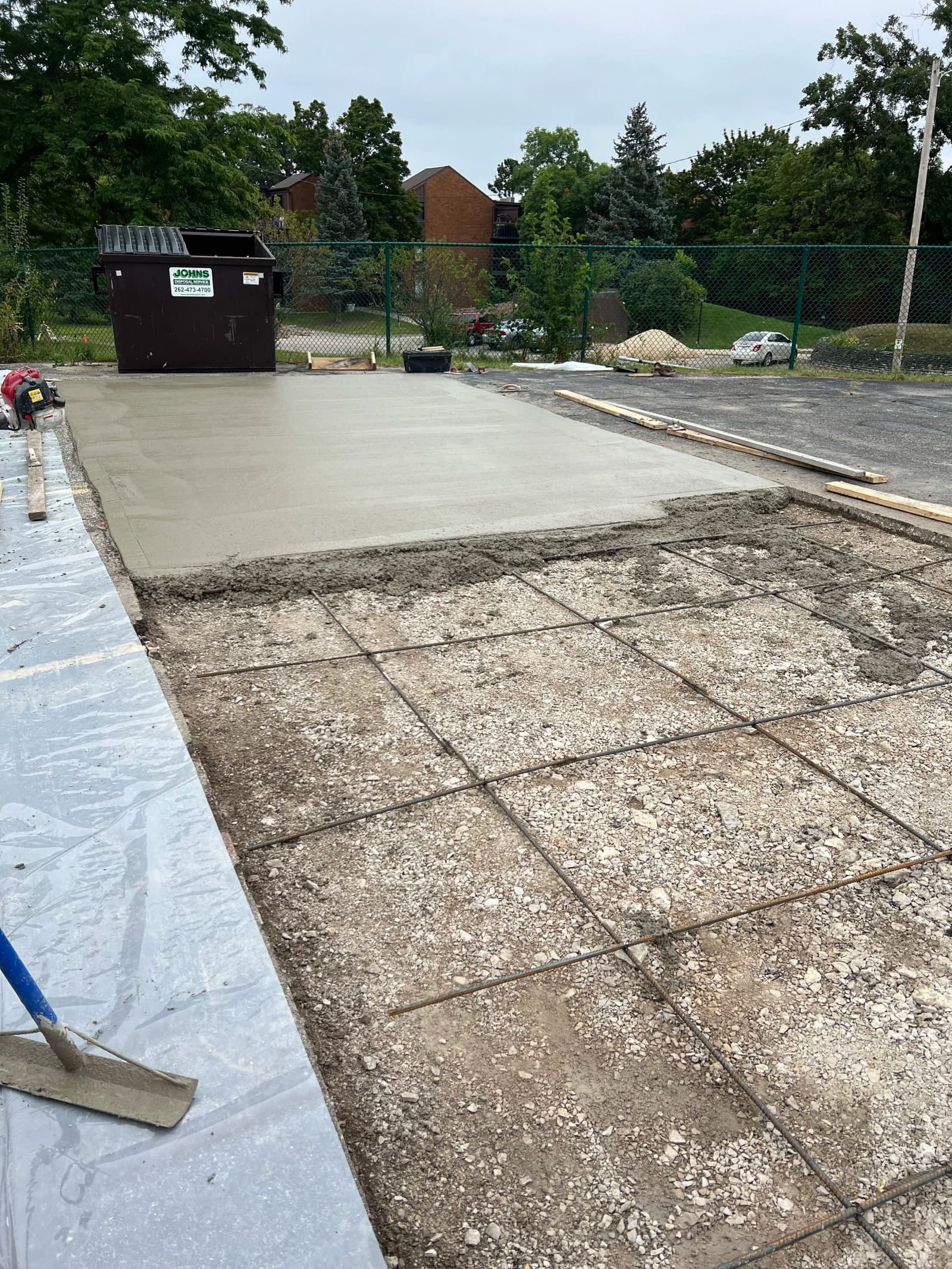 Freshly poured concrete slab at a Milwaukee apartment complex